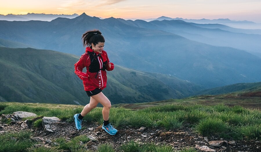 Woman running in Altra shoes